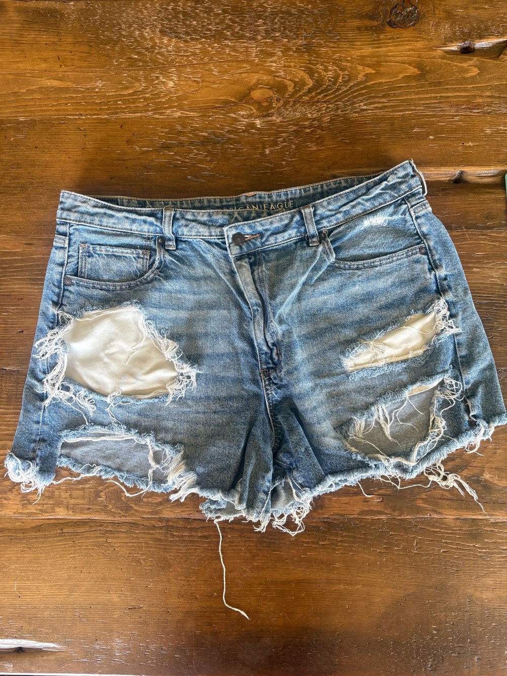 Distressed Light Blue Denim Shorts - Women
